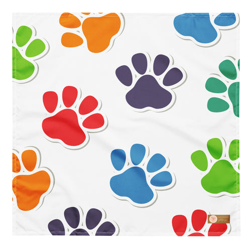 All-over print bandana featuring a playful paw prints pattern, perfect for adding style to your furry friend's wardrobe